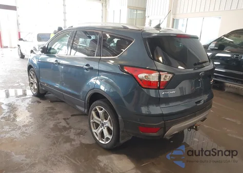 2018 Ford Escape Titanium z USA, uszkodzony, nr VIN 1FMCU9J98JUB73466